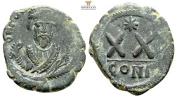 Phocas. 602-610. AE half follis (24,6 mm, 6.5 g, ). Constantinople mint. D N FOCA PERP AVG, crowned bust facing wearing consular robes and holding map...
