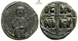 Anonymous follis attributed to Michael IV (1034-1041 AD). Constantinople
AE follis (26,5 mm 5,1 g)
Obv: ЄMMANOVHA, IC-XC, three-quarter length figure ...