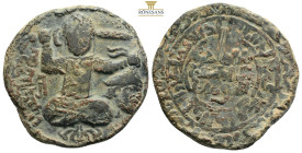 Artuqiden von Mardin. Husam ad-Din Yulug Arslan (580 - 597 / 1184 - 1201).
Dirham (Kupfer). 596 H. Mardin.
Vs: Bärtiger frontal sitzender Mann mit Sch...