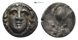 Greek coin ( 0.7g 9mm)
