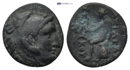 Greek coin ( 2.63g 15mm)