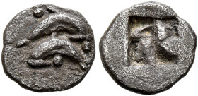 ISLANDS OFF THRACE, Thasos. Circa 500-480 BC. Obol (Silver, 9 mm, 0.50 g, 1 h). Two dolphins swimming in opposite directions; pellets around. Rev. Qua...