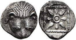 CIMMERIAN BOSPOROS. Pantikapaion. Circa 460-450 BC. Triobol (Silver, 14 mm, 2.20 g). Facing head of a lion. Rev. Star of four rays and four petals wit...