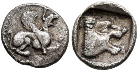TROAS. Assos. Circa 450-400 BC. Obol (Silver, 10 mm, 0.58 g, 7 h). Griffin leaping right. Rev. Head of a lion to right; all within incuse square. BMC ...