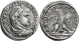 PHOENICIA. Tyre. Caracalla, 198-217. Tetradrachm (Billon, 27 mm, 13.05 g, 11 h), 213-217. ΑΥΤ ΚΑΙ ΑΝΤⲰΝΙΝΟC CЄ Laureate, draped and cuirassed bust of ...