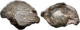 ISLAMIC. Circa AH 2nd-4th century / AD 8th-10th century. Seal (Lead, 27 mm, 10.21 g), with a string hole. Illegible Kufic inscription in three lines, ...