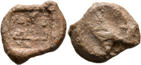 ISLAMIC. Circa AH 2nd-4th century / AD 8th-10th century. Seal (Lead, 19 mm, 7.62 g), with a string hole. Illegible Kufic inscription on one side in th...