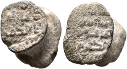 ISLAMIC. Circa AH 2nd-4th century / AD 8th-10th century. Seal (Lead, 15 mm, 10.77 g). Illegible Kufic inscriptions on both sides in the widely spaced ...
