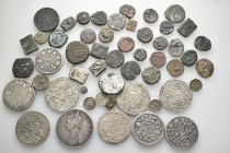 A lot containing 52 silver and bronze coins. Mainly: India and Shahis. Fine to very fine. LOT SOLD AS IS, NO RETURNS. 52 coins in lot.


From the c...