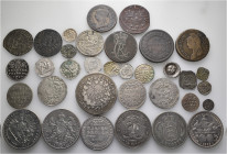 A lot containing 34 silver and bronze coins. Including: Medieval and World. Two coins struck of 'Glockenmaterial'. About very fine to extremely fine. ...