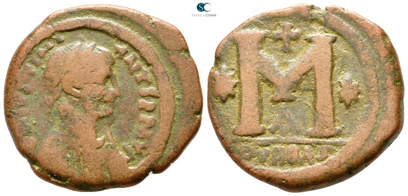 Justinian I. AD 527-565. Theoupolis (Antioch)
Follis Æ

29mm., 14,12g.


...