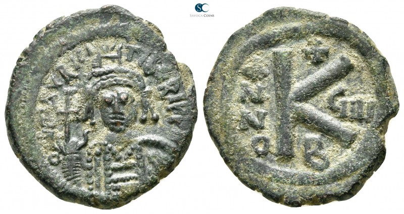 Maurice Tiberius AD 582-602. Constantinople
Half follis Æ

21mm., 5,71g.

...
