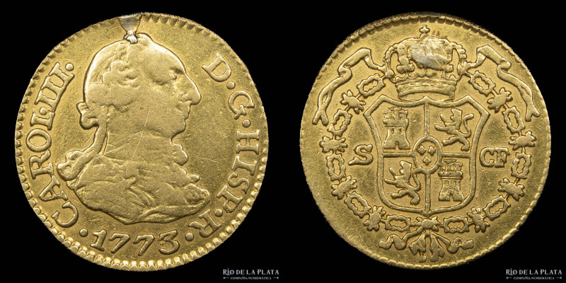 España. Carlos III. 1/2 Escudo 1773. AU.901; 15mm; 1,73g. KM415 (XF) restos de s...