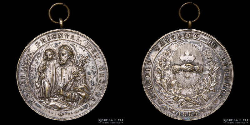 Uruguay. 1885. Círculo Católico de Obreros. Metal plateado; 39mm; 23.32g. (VF+)...