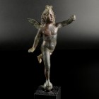 Roman Eros Statuette
1st-3rd century CE
Bronze, 150 mm (180 mm including base)
Massive cast. Nude winged Eros floating forward, standing on a globe...