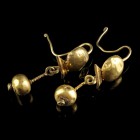 Roman Gold Earring Pair
2nd-3rd century CE
Gold, 40 mm, 4,28 g total
Intact and wearable. 
Very fine condition.
Ex. Coll. M.D., acquired at the e...
