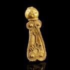 Roman Gold Pendant
1st-3rd century CE
Gold, 24 mm, 1,53 g
Probably part of an earring or necklace. 
Very fine condition.
Ex. Coll. E.K., acquired...
