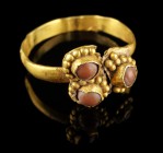 Roman Gold Ring
2nd-3rd century CE
Gold, Stone, 22 mm overall, 19 mm internal diameter, 3,50 g
Massive gold ring with quartered bezel, each section...