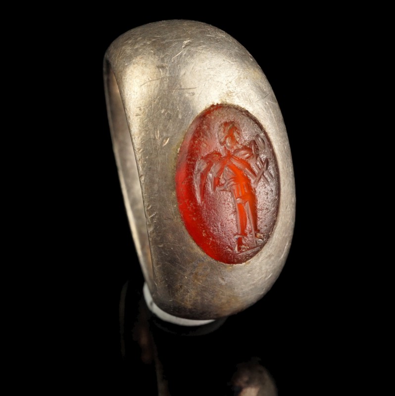 Roman Silver Intaglio Ring
1st-3rd century CE
Silver, Carnelian, 25 mm overall...