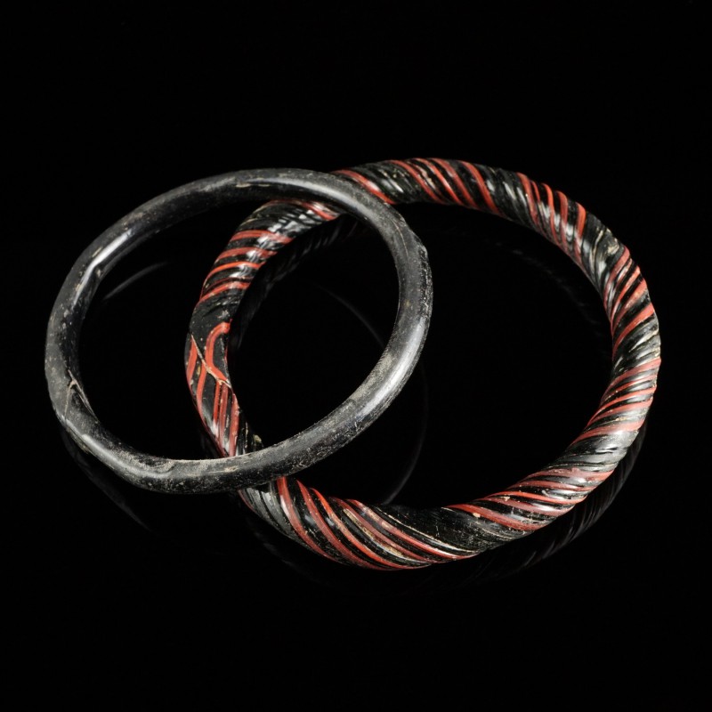 Roman Glass Bracelets
1st-4th century CE
Black/Red Glass, 64-80 mm
Intact.
V...