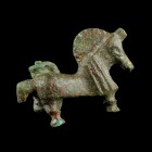 Roman Horse Brooch
2nd-3rd century CE
Bronze, 38 mm

Very fine condition. Pin is missing.
Ex. Coll. M.W., acquired at the austrian art market.