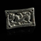 Avar Belt Mount
8th century CE
Bronze, 34 mm
Intact belt mount, depicting a griffin.
Very fine condition.
Ex. Coll. M.D., acquired at the europea...