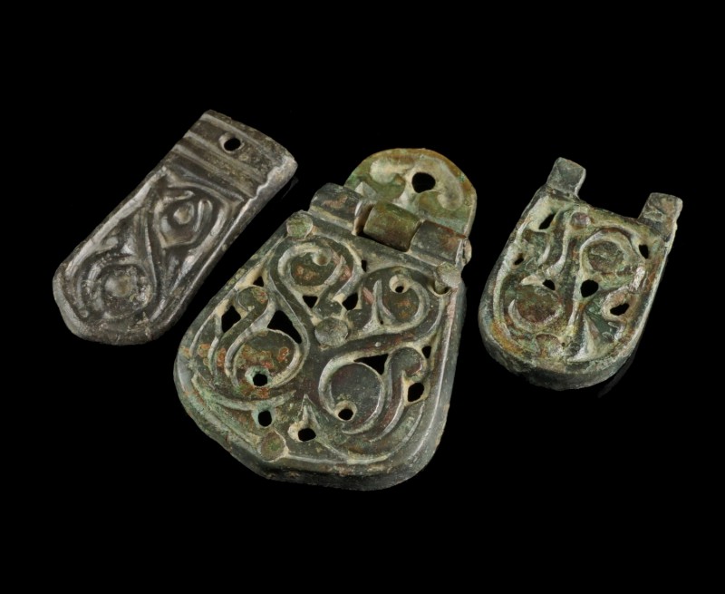 Avar Strap Ends/Mounts
8th century CE
Bronze, 27-44 mm
3 ornamented strap-end...