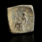 Greek Lead Weight
3rd-2nd century BCE
Lead, 26 mm, 33,61 g
Monogram/Apollo seated on omphalos holding arrow and bow.
Very fine condition. Rare!
E...