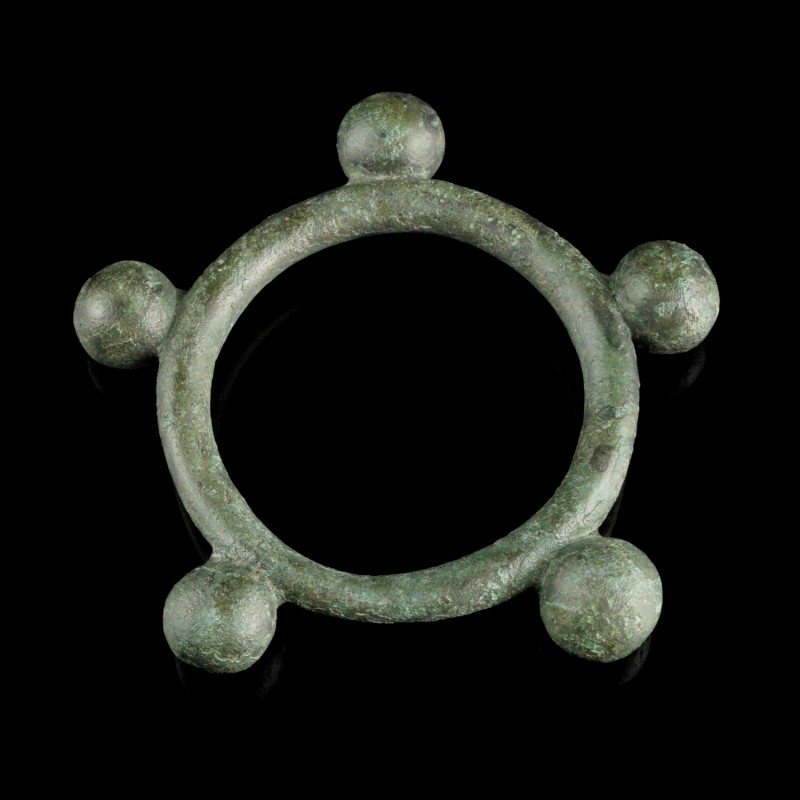 Celtic Bronze Ring/Amulet
3rd-1st century BCE
Bronze, 64 mm
Intact. Five knob...
