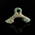 Roman Hooves Pendant
1st-3rd century CE
Bronze, 42 mm
Intact and wearable. Depicting two animal hooves. Rare!
Very fine condition. 
Ex. Coll. M.C...