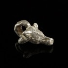 Roman Silver Calf's Head Pendant
1st-3rd century CE
Silver, 23 mm; 6,80 g
Intact and wearable. Massive cast.
Very fine condition.
Ex. Coll. M.C.,...