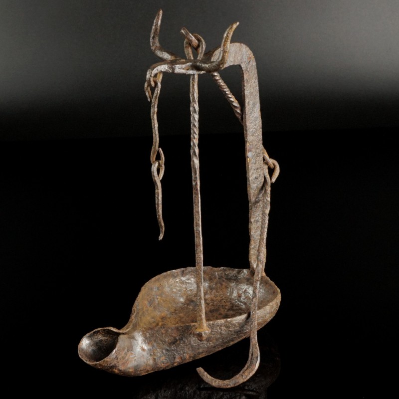 Celtic Iron Oil Lamp
2nd-1st century BCE
Iron, 59 cm total
Stylised horns on ...