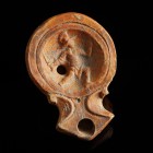 Roman Oil Lamp with Thrax Gladiator
1st-2nd century CE
Clay, 82 mm
Showing a Thrax Gladiator.
Very fine condition. Some incrustations.
Ex. Coll. ...