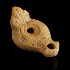 Roman Oil Lamp
1st-3rd century CE
Clay, 84 mm
Showing ornaments. Handle formed as a leaf.
Fine condition.
Ex. Coll. B.K., acquired at the europea...