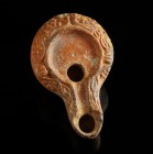Roman Oil Lamp
1st-3rd century CE
Clay, 87 mm
Floral decorations. Producer stamp "FLAVI"
Fine condition. Small spallings.
Ex. Coll. B.K., acquire...