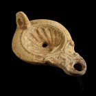 Roman Oil Lamp
1st-3rd century CE
Clay, 94 mm

Fine condition. Some deposits.
Ex. Coll. B.K., acquired at the european art market.