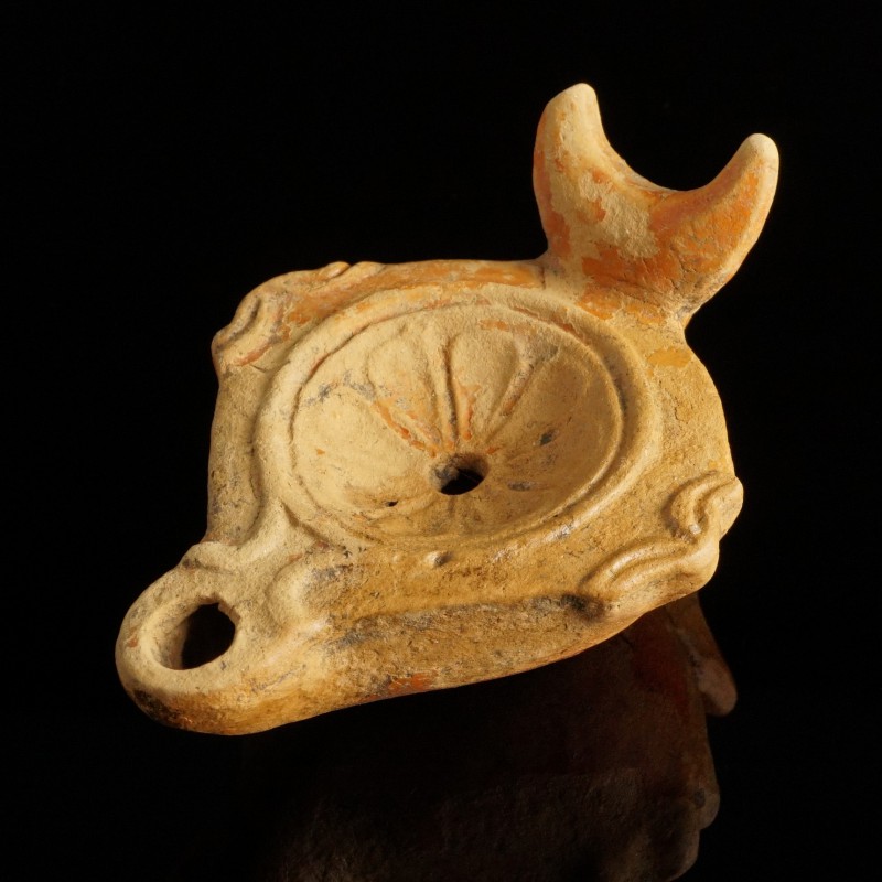 Roman Oil Lamp
1st-2nd century CE
Clay, 101 mm
Crescent-formed handle.
Very ...
