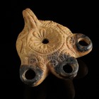Roman Oil Lamp
2nd-4th century CE
Clay, 89 mm
Richly decorated. Three spouts.
Very fine condition.
Ex. Coll. B.K., acquired at the european art m...