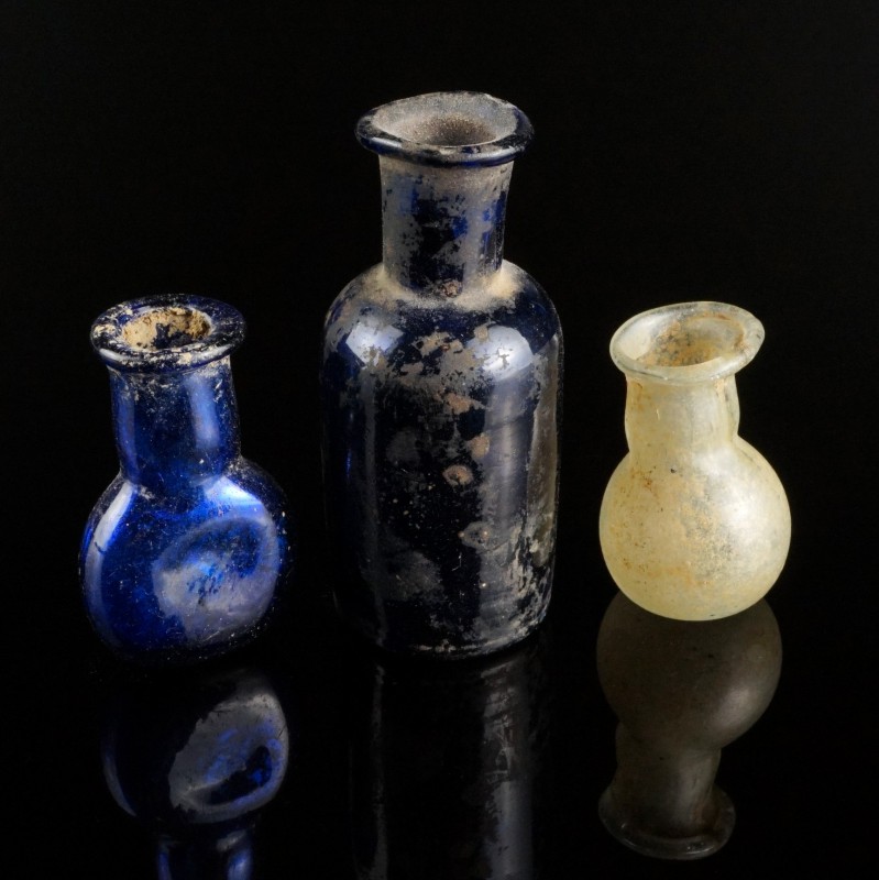 Three Glass Bottles
Ancient-Modern
White/Blue Glass, 30-55 mm

Very fine con...
