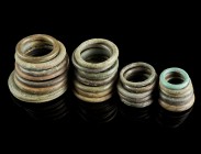24 Bronze Rings
Celtic/Roman
Bronze/Copper Alloy, 20-45 mm
Different types. Some rings with decorations.
Fine condition.
Ex. Coll. M.D., acquired...