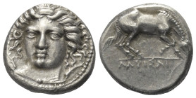 Thessalien. Larissa.

 Drachme (Silber). Ca. 404 - 370 v. Chr.
Vs: Kopf der Nymphe Larissa mit Ampyx en face, leicht nach links gewendet.
Rs: Pfer...