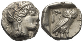 Attika. Athen.

 Tetradrachme (Silber). Ca. 454 - 404 v. Chr.
Vs: Kopf der Athena mit ölzweiggeschmücktem attischem Helm, Ohranhänger und Halskette...