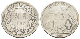 Schweiz. Eidgenossenschaft.

 2 Franken (Silber). 1862 B. Bern.
Vs: Wertangabe und Jahreszahl im Lorbeerkranz.
Rs: Helvetia sitzen links.

27 mm...