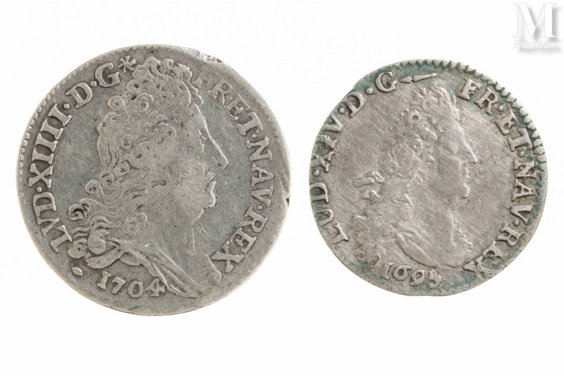 France - Louis XIV (1643-1715)

Lot de deux monnaies comprenant : 
-Une 4 sol...