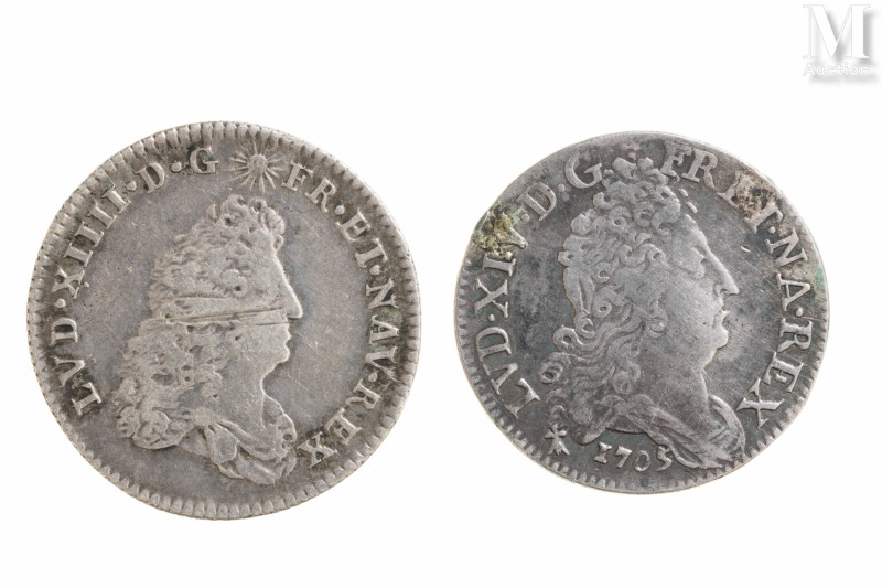 France - Louis XIV (1643-1715)

Lot de deux monnaies comprenant :
-1/8e d'Ecu...