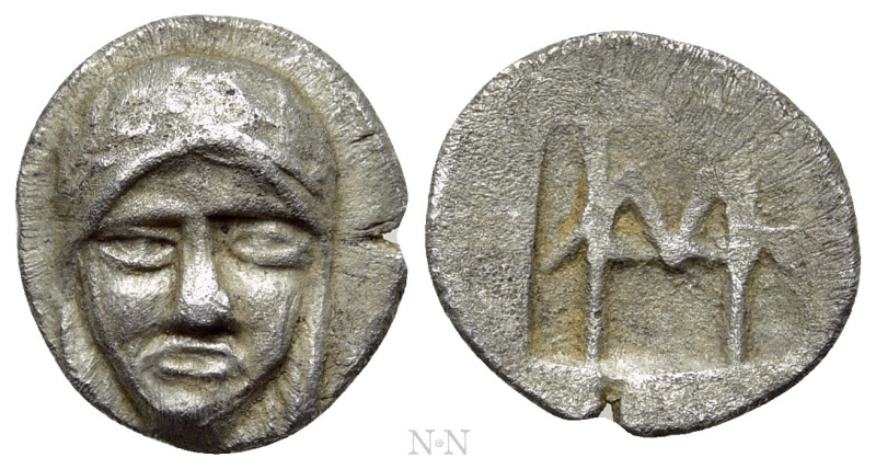 IONIA. Kolophon. Hemiobol (Circa 450-410 BC). 

Obv: Facing head of Apollo.
R...