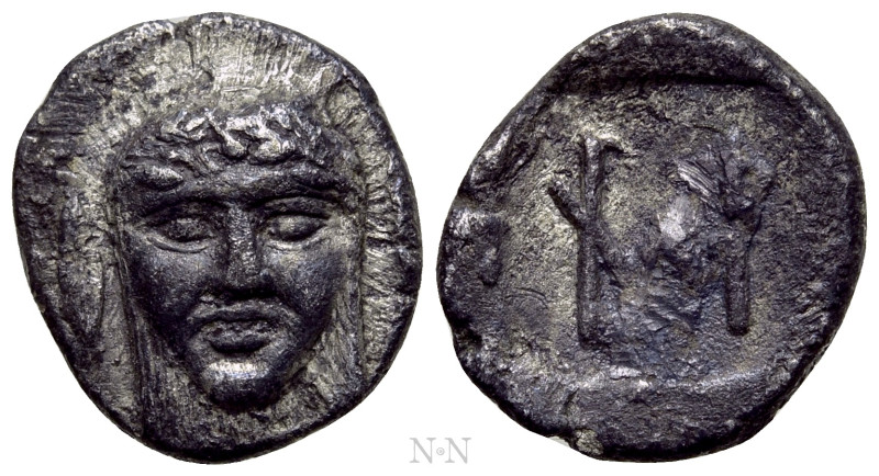 IONIA. Kolophon. Hemiobol (Circa 450-410 BC). 

Obv: Facing head of Apollo.
R...