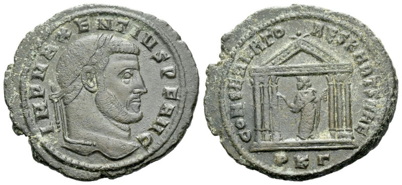 Maxentius, 306-312 Follis Carthago 307, Æ 27.00 mm., 7.22 g.
Laureate head r. R...