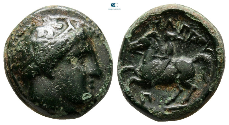 Kings of Macedon. Uncertain mint. Philip II of Macedon 359-336 BC. 
Bronze Æ
...