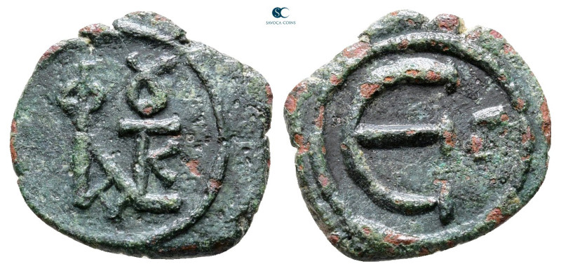 Justin II AD 565-578. Constantinople
Pentanummium Æ

15 mm, 1,39 g



Ver...